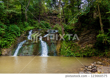 Forest waterfalls in the mountains 123668575