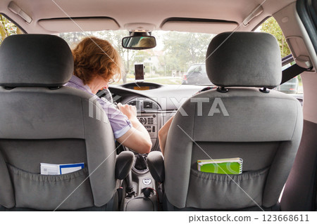 Happy man and woman in car Happy man and woman in car 123668611