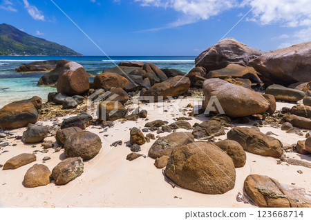 Rocky beach with clear turquoise water, Beau Vallon, Seychelles Rocky beach with clear turquoise water, Beau Vallon, Seychelles 123668714