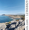 Scenic Coastal View from Rocky Cliff in Gazipasa Turkey with Sea, Koru Beach, and Mountains 123668829