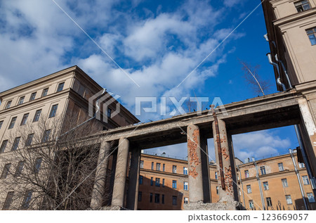A historic damaged building with rusticated architectural details 123669057