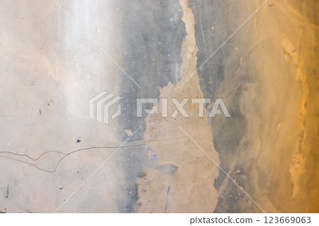 Textured surface featuring an abstract interplay of yellow and gray Textured surface featuring an abstract interplay of yellow and gray 123669063