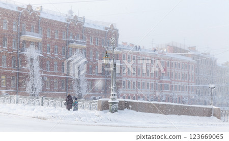 A serene urban scene showcasing a snowy winter day. Saint-Petersburg A serene urban scene showcasing a snowy winter day. Saint-Petersburg 123669065