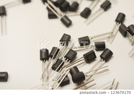 Old transistors on a white background. Electronic elements. Old transistors on a white background. Electronic elements. 123670170
