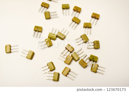 Old transistors on a white background. Electronic elements. Old transistors on a white background. Electronic elements. 123670173