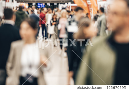 Abstract blurred people at exhibition hall of expo event trade show. Business convention show or job fair. Business concept background 123670395