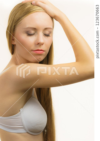 Girl long hair wearing bra Girl long hair wearing bra 123670663