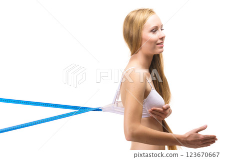 Woman wearing too big bra, loose band Woman wearing too big bra, loose band 123670667