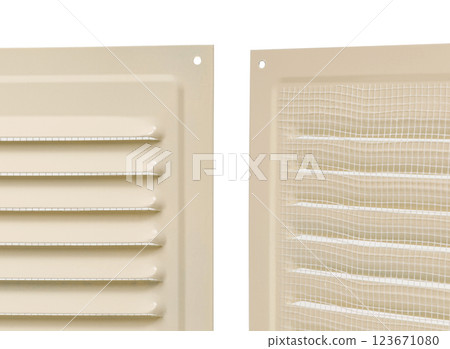 Ventilation grate isolated on a white background. Material aluminum. Color beige. Close-up. Front and back side. Ventilation grate isolated on a white background. Material aluminum. Color beige. Close-up. Front and back side. 123671080