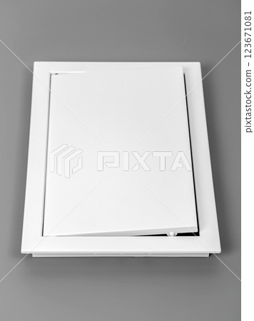 White plastic hatch on a gray background. Rectangular shape. White plastic hatch on a gray background. Rectangular shape. 123671081