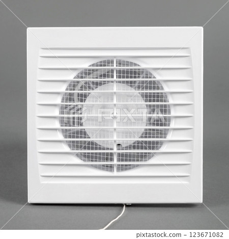 White fan on a gray background. Ventilation system. 123671082