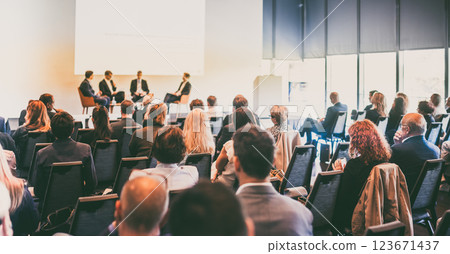 Interview and round table discussion at business convention and presentation. Audience at the conference hall. Business and entrepreneurship symposium. 123671437