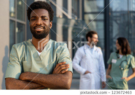 Waist up picture of a young african american doctor 123672463