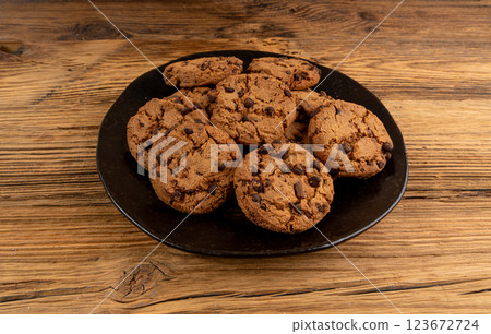 Chocolate chips cookies , American biscuits, cocoa confectionery cake, sweet morsels bakery Chocolate chips cookies , American biscuits, cocoa confectionery cake, sweet morsels bakery 123672724
