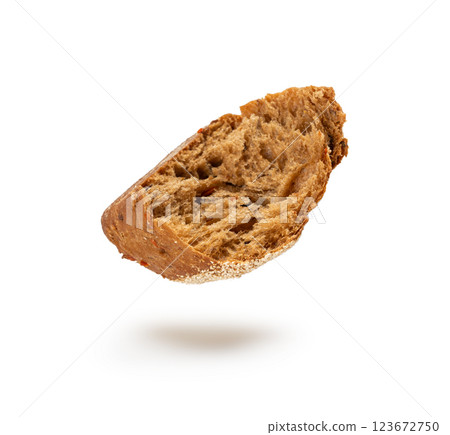 Broken wheat brown bread pieces isolated, fitness pumpkin carrot buns with seeds, cereal bread Broken wheat brown bread pieces isolated, fitness pumpkin carrot buns with seeds, cereal bread 123672750