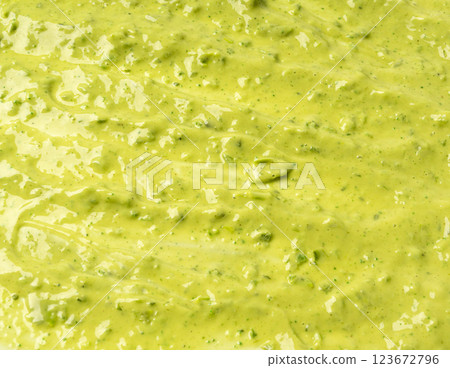 Green mojo verde sauce smear, dressing splatter drip, Canary Islands food Green mojo verde sauce smear, dressing splatter drip, Canary Islands food 123672796