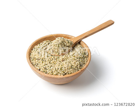 Shelled hemp seeds pile isolated, peeled cannabis grains, marijuana kernels without peel 123672820