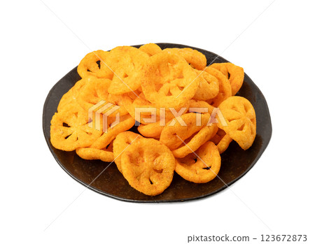 Corn puff snack isolated, crunchy cereal nosh, crispy yellow rice breakfast with paprika 123672873