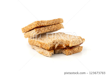 Bitten dried pate sandwich isolated, low-quality food leftovers, bad quality toast bread lunch 123673783