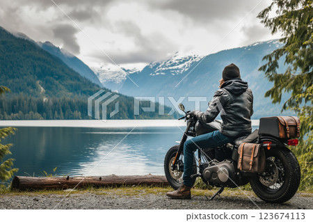 Tranquil lakeside motorcycle retreat in the midst of nature's scenic mountains and forest. Offering a serene getaway for bikers to experience adventure. Leisure 123674113