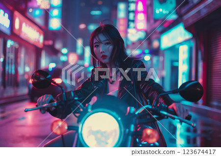 Stylish young woman poses confidently on her motorcycle amidst the dazzling neon lights of a vibrant urban streetscape at night 123674417