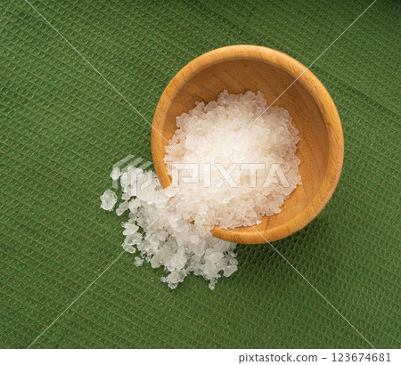 Dead sea salt pile, white crystals for body spa, sodium chloride similar to crushed ice, spa scrub 123674681