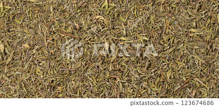 Dry thyme texture, dried marjoram pattern, oregano pile background, ground crushed thyme seasoning mockup 123674686
