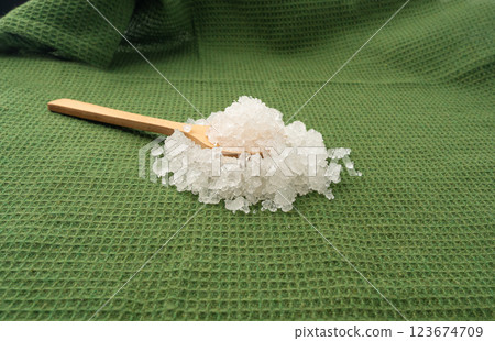 Dead sea salt pile, white crystals for body spa, sodium chloride similar to crushed ice, spa scrub 123674709