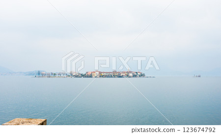 Beautiful aerial view of Lake Maggiore and Isola dei Pescatori. Fishermen island. Magical atmosphere with morning mist 123674792