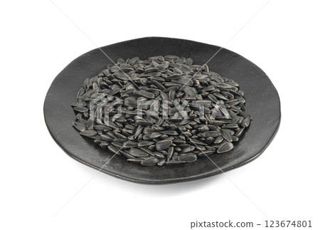 Sunflower seeds pile isolated, black oil sun flower grains group with shell, fresh edible oil seeds heap Sunflower seeds pile isolated, black oil sun flower grains group with shell, fresh edible oil seeds heap 123674801