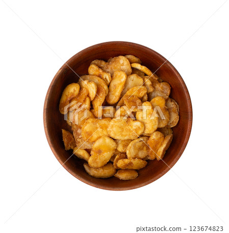 Roasted broad beans snack isolated, fried vicia faba, spicy legume, crispy big beans chips for salads Roasted broad beans snack isolated, fried vicia faba, spicy legume, crispy big beans chips for salads 123674823