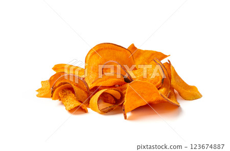 Dry sweet potato chips isolated, dried sliced red vegetable, healthy crispy snack flakes pile Dry sweet potato chips isolated, dried sliced red vegetable, healthy crispy snack flakes pile 123674887