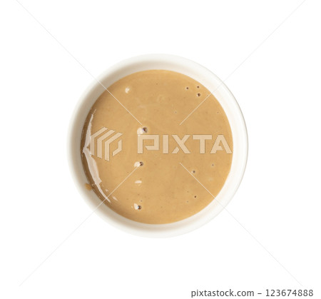 Tahini, sesame seeds paste, tahina sauce, eastern dip, traditional oriental ground sesame 123674888