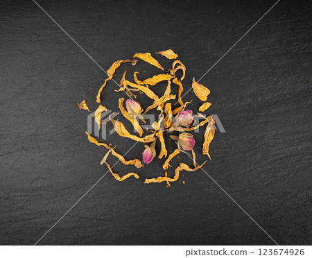 Dried edible flowers mix, Helichrysum arenarium pile, dwarf everlast petals, medical herb tea pile 123674926