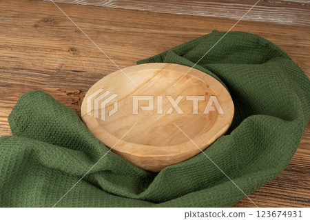 Empty wood bowl on table, plate on wooden table and tablecloth, light rustic dish mockup 123674931