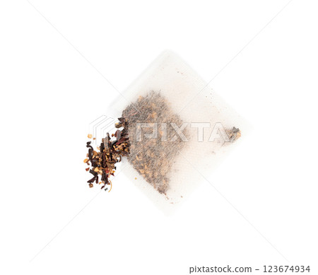 Dry black tea bag with hibiscus, fruits isolated. Raspberry seeds red tea sachet, herbal drink Dry black tea bag with hibiscus, fruits isolated. Raspberry seeds red tea sachet, herbal drink 123674934