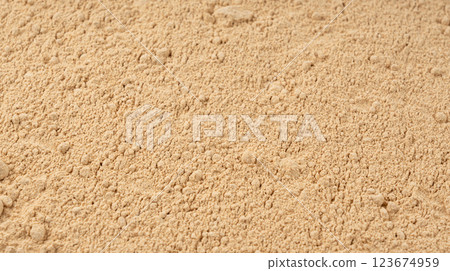 Maca powder texture background, dry Peruvian ginseng powder pattern, ground ayak willku Maca powder texture background, dry Peruvian ginseng powder pattern, ground ayak willku 123674959