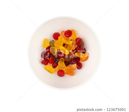 Fruit gummy candy pile isolated, vegan chewing marmalade pills, jelly gumdrops heap Fruit gummy candy pile isolated, vegan chewing marmalade pills, jelly gumdrops heap 123675001