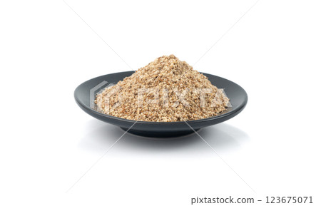 Milk thistle seeds powder, crushed silybum marianum grains pile, milled dry blessed milkthistle 123675071