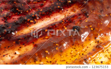 Color jam with chili, chilli pepper marmalade smear mix, spicy fruit jelly fruity confiture smudge 123675153