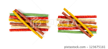 Rawhide chew sticks for dogs, colorful collagen dog food, pressed dry kibble, dental care treats Rawhide chew sticks for dogs, colorful collagen dog food, pressed dry kibble, dental care treats 123675181