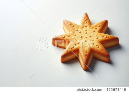 Star-shaped shortbread cookies on a light background. Space for text. 123675446