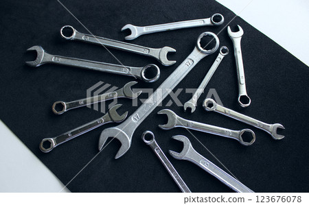 Metallic color spanners from one kit on black anti slip sheet  123676078