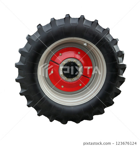 The large tractor wheel features a thick, rugged tire designed for tough terrains, with an eye-catching red hub in the center. This wheel is perfect for agricultural machinery. The large tractor wheel features a thick, rugged tire designed for tough terrains, with an eye-catching red hub in the center. This wheel is perfect for agricultural machinery. 123676124