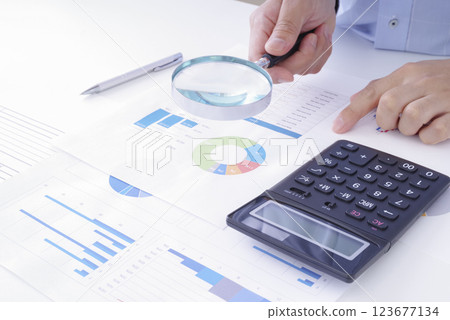 Image of examining corporate data Image of examining corporate data 123677134