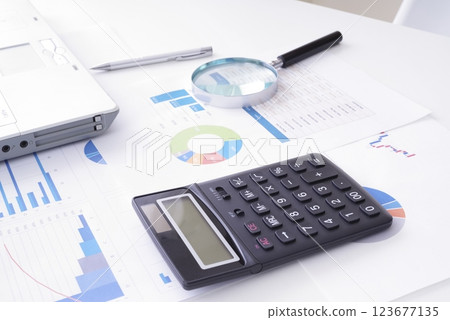 Image of examining corporate data Image of examining corporate data 123677135