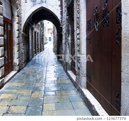Mystical ancient stone streets run through the historic center of Split Mystical ancient stone streets run through the historic center of Split 123677370