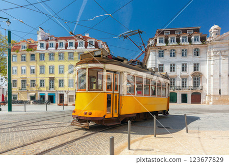 Traditional old yellow tram, Lisbon, Portugal Traditional old yellow tram, Lisbon, Portugal 123677829