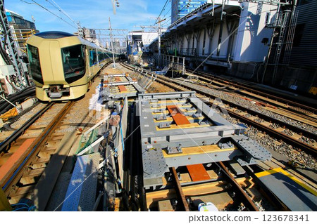 Tobu Limited Express [Liberty] 500 series train heading to "Tokyo Skytree Station" where the outbound line is about to be elevated 123678341