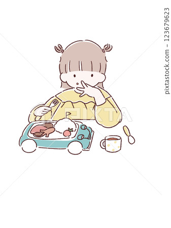 A child licking his fingers while eating a children's lunch 123679623